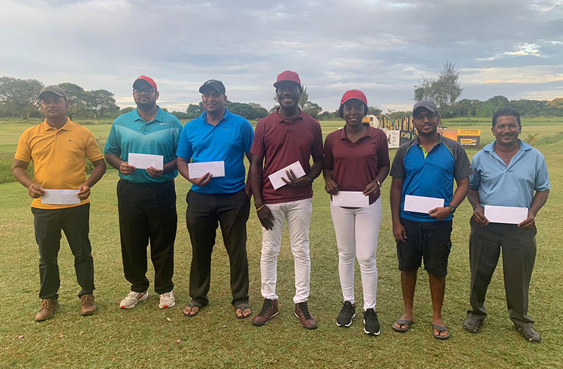 The various winners of Saturday’s tournament:  Shanella London (third from right) and Philbert London (fourth from right)
