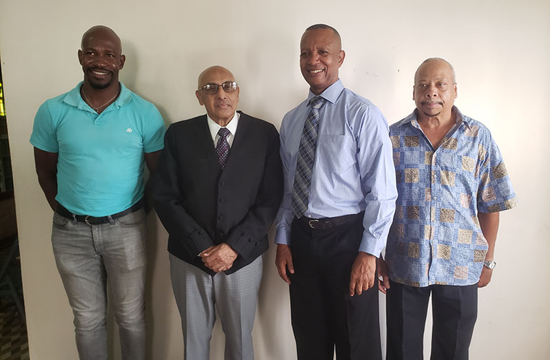From left: GASA president Dwayne Scott, GOA president K.A Juman-Yassin, Athletics Guyana president Aubrey Hutson and Keith Campbell of Athletics Guyana after the presentation on Wednesday