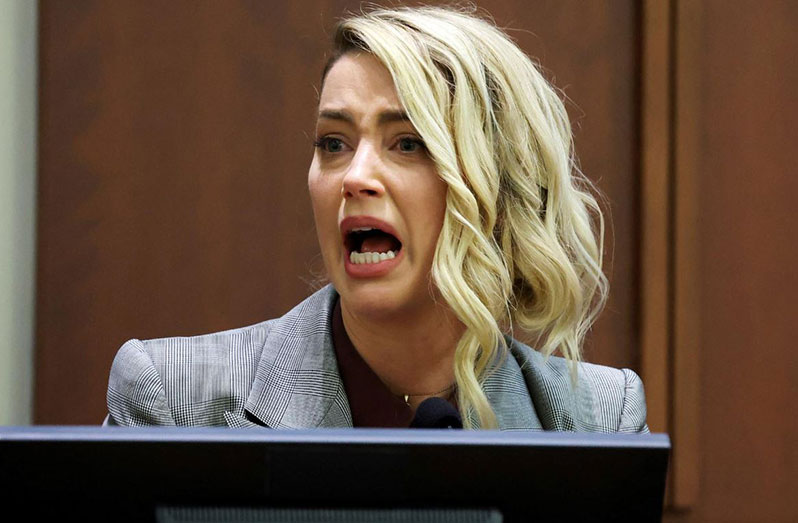 Actor Amber Heard testifies during the Depp vs Heard defamation trial at the Fairfax County Circuit Court in Fairfax, Virginia, U.S. May 26, 2022. Michael Reynolds/Pool via REUTERS
