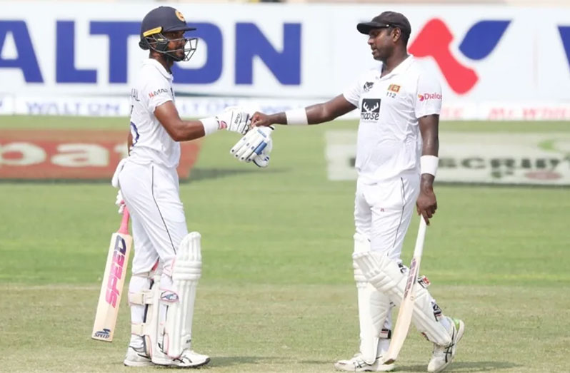 Dinesh Chandimal (left) and Angelo Mathews added 199 runs for the sixth wicket (AFP/Getty Images)