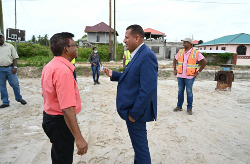 Minister of Housing and Water Collin Croal and GWI’s Chief Executive Officer, Shaik Baksh at the inspection of the water distribution system at Providence, East Bank Demerara