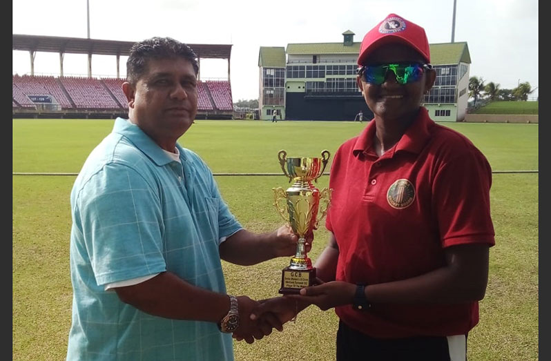 All-rounder Shabika Gajnabi collects her player-of-the-match award from National selector, Peter Persaud