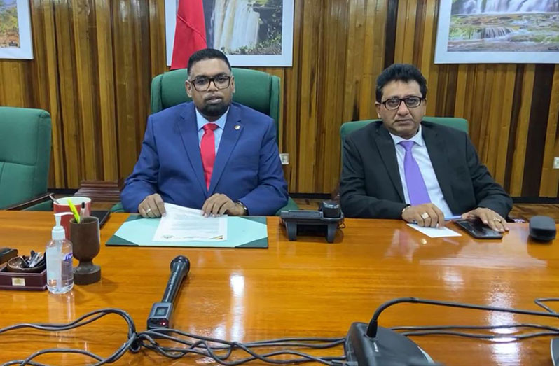 President Dr. Irfaan Ali and Attorney General Anil Nandlall during a live stream on the President’s official Facebook page
