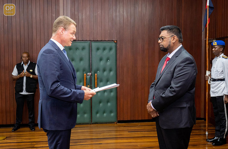 Non-Resident Ambassador Extraordinary and Plenipotentiary of the Kingdom of Norway to Guyana, Odd Magne Ruud presenting his Letters of Credence to President, Dr Irfaan Ali (Office of the President photo)