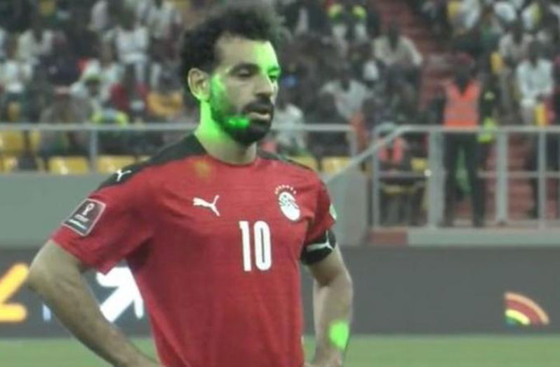 Mohamed Salah was one of several players targeted by laser pens directed from the crowd, as he prepared to take his penalty