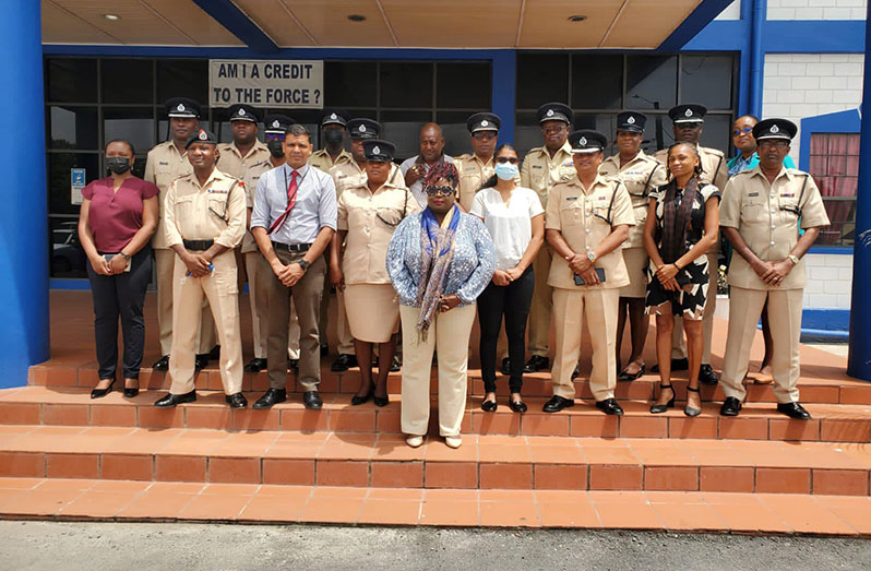 NAPS officials with Police Commanders and senior officers who participated in the sensitivity training at the Guyana Police Force Officer’s Training Centre