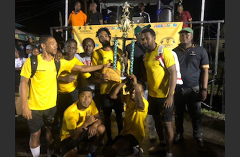 Swag Entertainment pose with the trophy