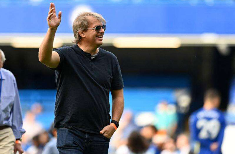 Chelsea’s prospective US owner Todd Boehly comes onto the pitch to join the lap of honour after the English Premier League football match against Watford at Stamford Bridge in London on Sunday. (Photo: AFP)