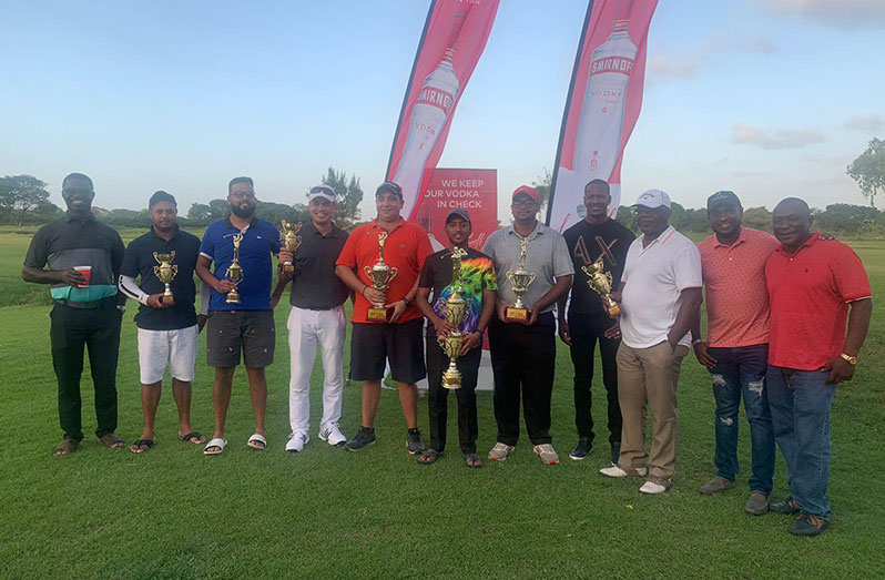 Rohan Albert (centre) with the other winners and officials at the tournament’s closing ceremony.