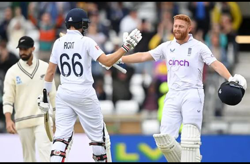 Jonny Bairstow celebrates victory with Joe Root. Photograph: Alex Davidson/Getty Images