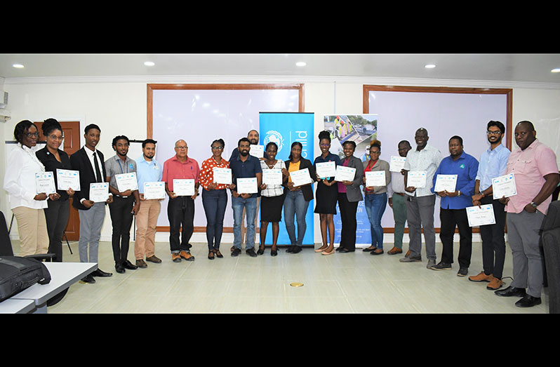 Participants with their certificates at the end of the WaSH in Emergency training at the Civil Defence Commission headquarters, Georgetown, on Thursday