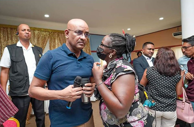 Vice-President, Dr Bharrat Jagdeo interacts with one of the persons at the fisherfolk meeting at the Classic International Hotel, on Thursday (Office of the Vice-President photo)