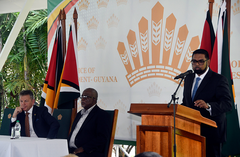 President Dr. Irfaan Ali outlines the expected benefits of the potential gas-to-energy project, as Prime Minister. Brigadier (Ret’d) Mark Phillips and President of ExxonMobil Upstream Oil and Gas, Liam Mallon look on (Adrian Narine photo)