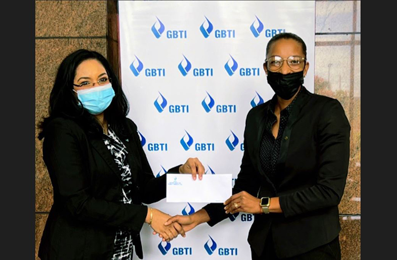 Public Relations and Marketing Manager of GBTI, Pamela Binda (left) presents the sponsorship cheque to GTA President, Cristy Campbell