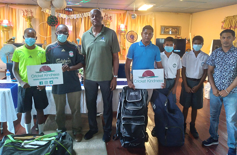 Representatives of the clubs and schools with West Indies legend, Courtney Walsh