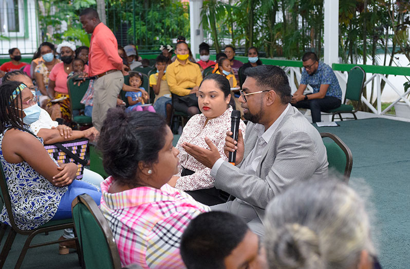 President Dr. Irfaan Ali and Mrs. Arya Ali meeting with parents who have children with disabilities at State House