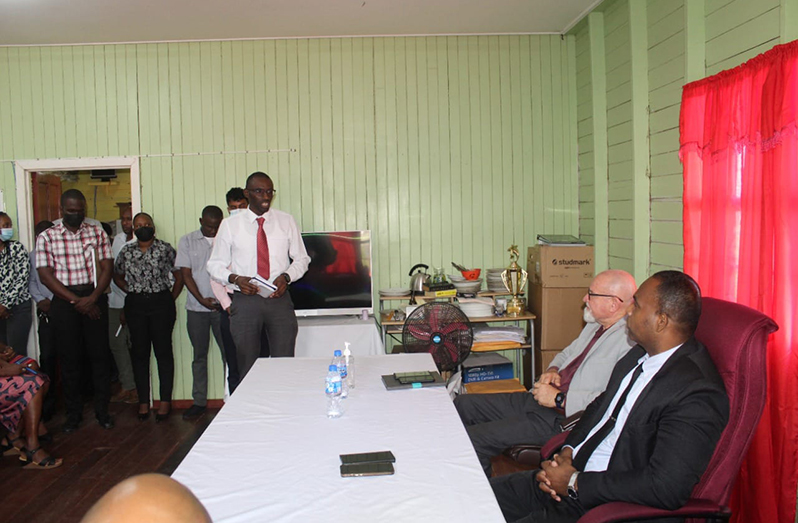 (Seated at left) PSC Chairman Bishop Patrick Findlay and Deputy Commissioner, Law Enforcement (ag.), Wendell Blanhum, listen to the concerns of CID ranks during the visit