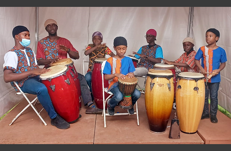 Obadiah Jones and the junior drummers of the Hebrew Family of Guyana Drummers