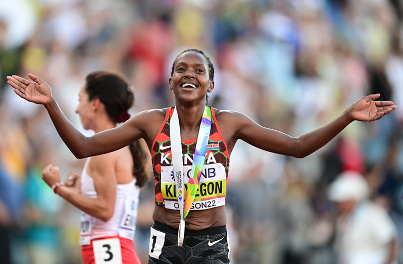 Kenya's Faith Kipyegon celebrates her  win the women's 1500 metres final REUTERS/Lucy Nicholson