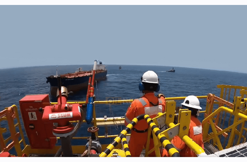 Crew onboard the Liza Destiny FPSO offshore Guyana prepare for an approaching oil tanker (Photo credit: OilNOW)