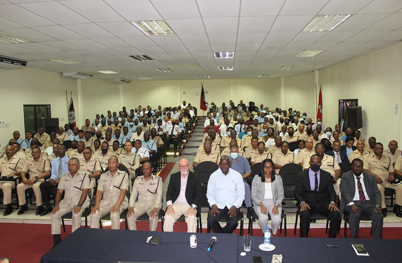 Minister of Home Affairs Robeson Benn and other security officials at the meeting with newly promoted officers