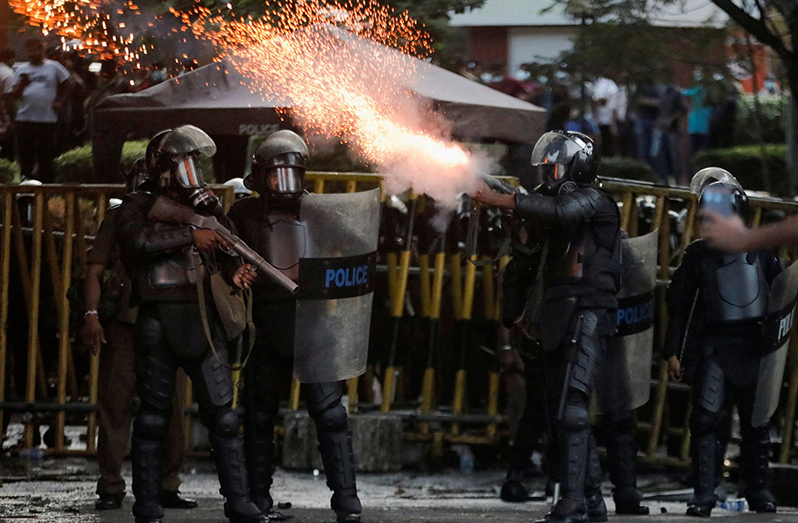 Police use tear gas and water cannons to disperse demonstrators near President's residence, during a protest demanding the resignation of President Gotabaya Rajapaksa, amid the country's economic crisis, in Colombo, Sri Lanka, July 8, 2022. REUTERS/Dinuka Liyanawatte