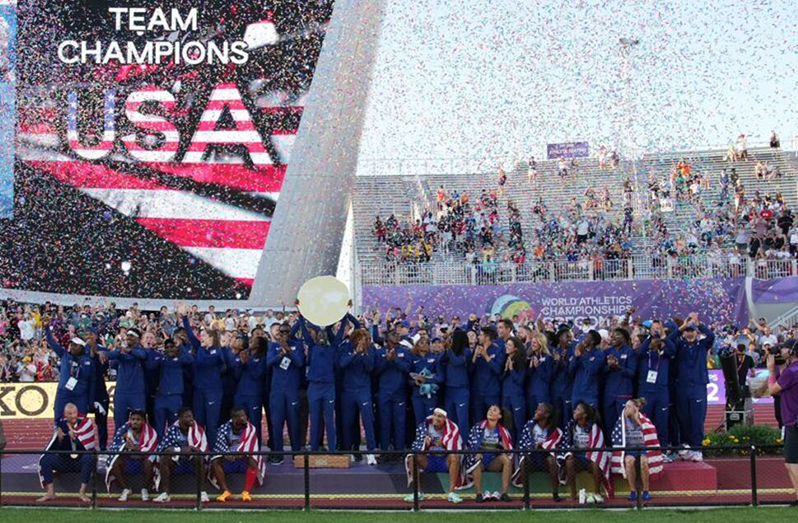 Eugene, Oregon, USA; The United States track and field team celebrates as team champions at the World Athletics Championships Oregon 22 at Hayward Field. Mandatory Credit: Kirby Lee-USA TODAY Photo saved: Team USA