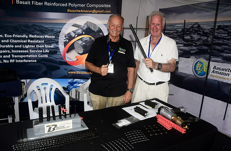 Basanite Amazon Marketing Correspondent, Jay Thompson and Managing Partner, Michael Dodds showcase the basanite rods at their booth at the International Building Expo (Adrian Narine photo)