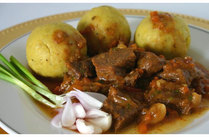 Foo-Foo paired with a beef stew (Photo credit: Guyana Dining)