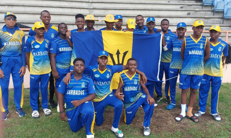 Barbados team and support staff pose for a group photo after they clinched the West Indies Rising Stars Under-15 cricket title yesterday in Grenada