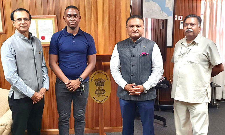 GDF Corporal Deron Jermin Harvey (second left) with High Commissioner of India Dr. KJ Srinivasa (second right), and other senior staffers at the High Commission in Georgetown