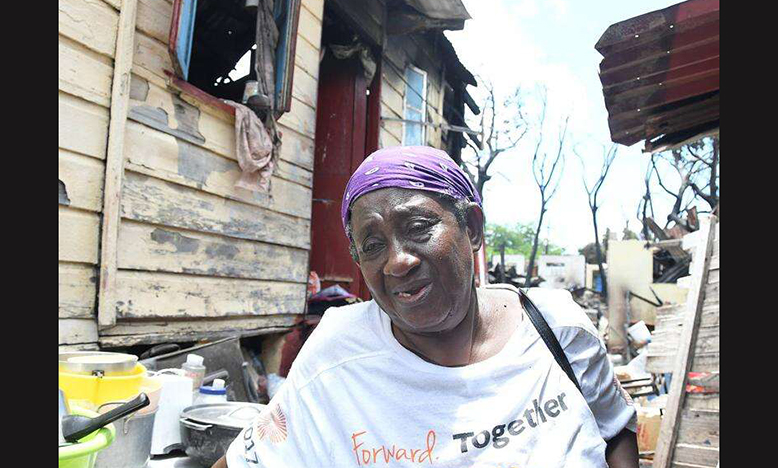 Lezreen Hyatt, a 65-year-old resident of Smith Lane in Central Kingston, is in a state of despair after her house was destroyed by fire early Monday morning. (Photo: Garfield Robinson; retrieved from Jamaica Observer)