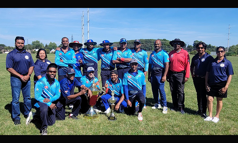 The victorious Mercenary team pose with OSCL officials. President Shiv Persaud is at extreme left.
