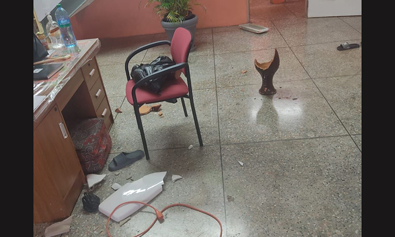 The broken toilet tank cover and broken pot used to attack the care giver at the St Jude’s Home for Girls in Belmont, on Saturday (Photo credit: T&T Guardian)