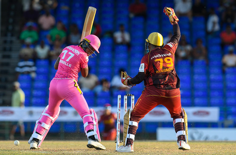 Chinelle Henry (L) of Barbados Royals bowled by Anisa Mohammed of TKR during the Women's 2022 Hero CPL Match 1 at Warner Park Sporting Complex yesterday in Basseterre, St Kitts & Nevis. (Photo by Randy Brooks - CPL T20/CPL T20 via Getty Images)