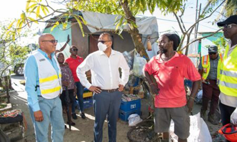 CDC’s Director-General, Colonel Nazrul Hussain; Health Minister, Dr Frank Anthony and windstorm victim, Rawle Lyght
