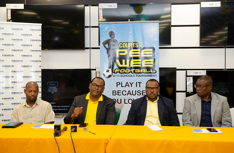 Director of Consumer Finance of COURTS Guyana Inc. (2nd from left) addressing the launch. Others at the head table (from left) Kurt Braithwaite, Troy Mendonca and Bryan Joseph.  (Delano Williams photo))