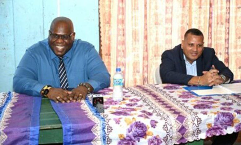 From left: Chief-Executive Officer of CHPA,-Sherwyn Greaves and Minister of Housing and Water, Collin Croal, at the outreach on Monday