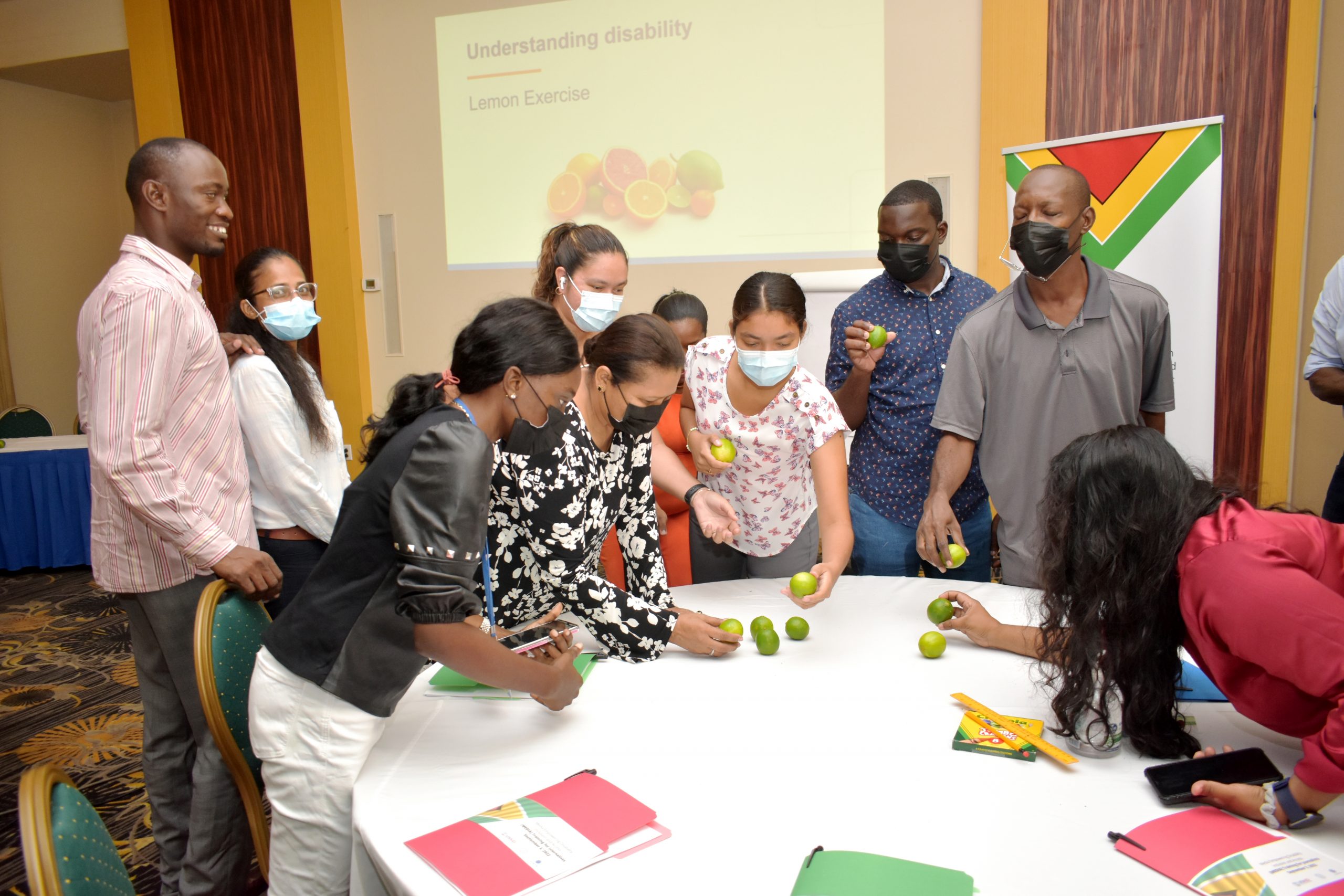 Some of the media workers participating in a diversity activity during the IFES Disability Rights Workshop (Elvin Croker photo)