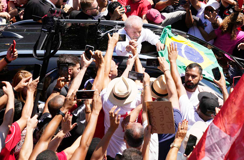 Lula da Silva waves at supporters after voting in a presidential run-off election in Sao Paulo, Brazil, Sunday (CNN photo)