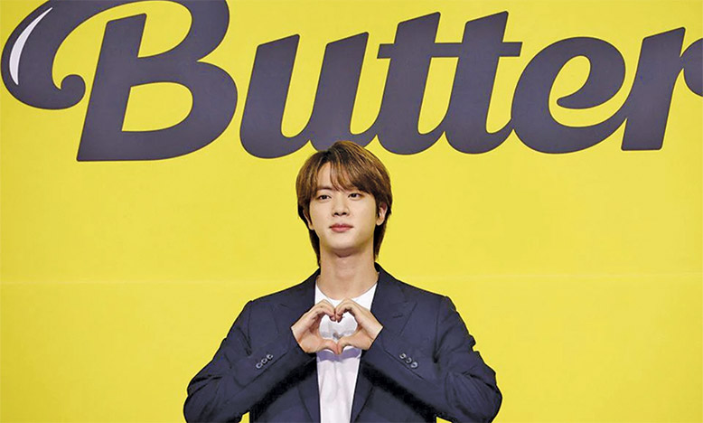 K-pop boy band BTS member Jin poses for photographs during a photo opportunity promoting their new single 'Butter' in Seoul, South Korea, on May 21, 2021 (REUTERS/Kim Hong-Ji/File Photo)