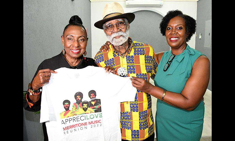 Monte Blake and his daughter Monique (right) present a branded T-shirt to Entertainment and Culture Minister, Olivia "Babsy" Grange (Jamaica Observer photo)