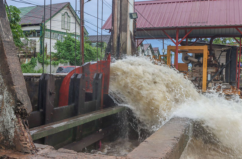 Draining a large volume of water into the Demerara River (DPI photo)