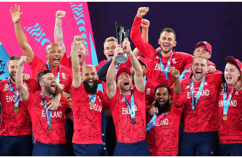 England's Jos Buttler holds aloft the trophy as they celebrate winning the T20 World Cup Scott Harbour/AAP Image via REUTERS