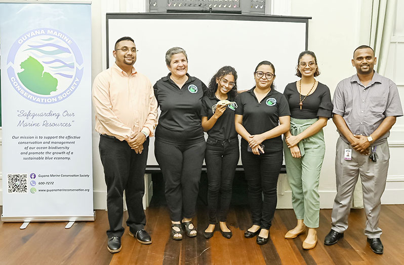Director of the Guyana Tourism Authority, Kamrul Baksh (left); Head of the GMCS, Annette Arjoon-Martins (second from left), Project Administration and Communication Officer for GMCS, Sarah Singh (third from left); Project Co-ordinator of the Guyana Marine Conservation Society, Olivia Rodrigues (third from right); Marine Biologist and GMCS Board Member, Hanan Lachmansingh (second from right), and IDB Private Sector Consultant, Kaimlall Chattergoon (right) (Delano Williams photo)