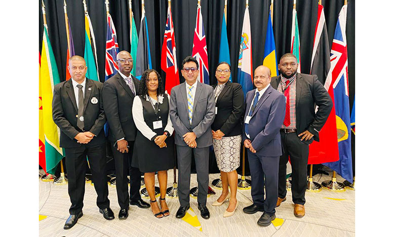 (From left) Fazil Karimbaksh - Head of the Special Organised Crime Unit (SOCU); Matthew Langevine, Director of the Financial Intelligence Unit (FIU); Natasha Backer – Assistant Director of Public Prosecutions; Mohabir Anil Nandlall, Attorney General and Minister of Legal Affairs; Alicia Williams Head of Compliance -FIU; Dr. Gobind Ganga, Governor of the Central Bank and Rommel St Hill, Anti Money Laundering/Caribbean Financial Task Force (AML/CFT) Officer in the Attorney General’s Office