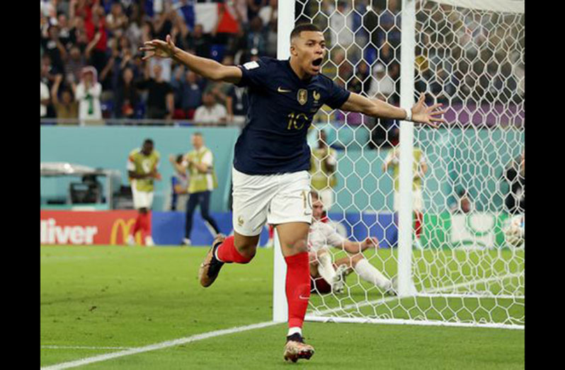 France's Kylian Mbappe celebrates scoring their second goal v Denmark, yesterday at Stadium 974, Doha, Qatar (REUTERS/Kim Hong-Ji)
