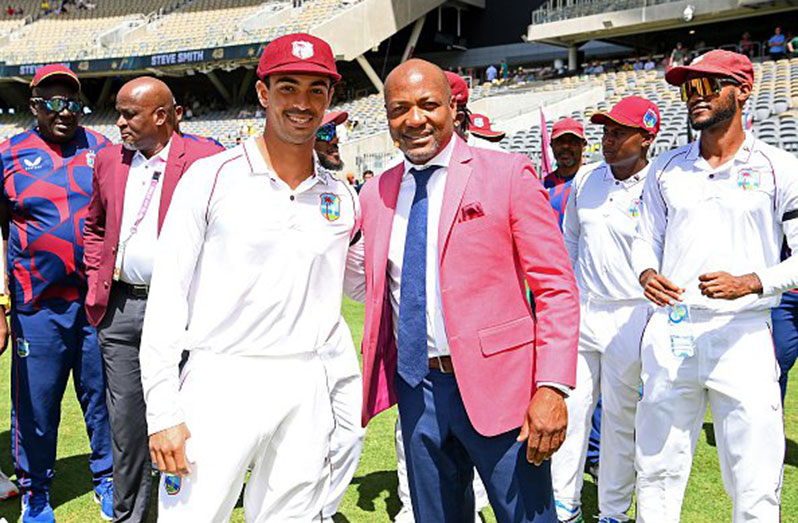 A moment he'll never forget! Tagenarine Chanderpaul receiving his Test cap from West Indies batting legend Brian Charles Lara