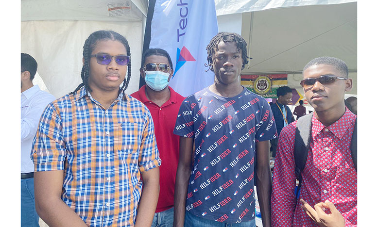 19-year-old Tyrese Aaron (left), his brother 16-year-old Mario Aaron (right) and 20-year-old Safwan Thomas were brought to the fair by father of the two brothers, Quincy Aaron (second from left) (Trina Williams photo)