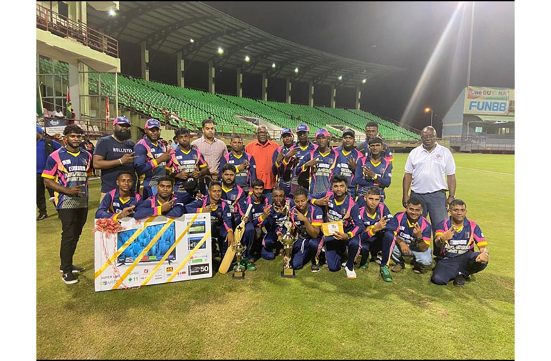 The victorious GKR Ariel All Stars team pose with Prime Minister Mark Phillips and GSCL president, Ian John.